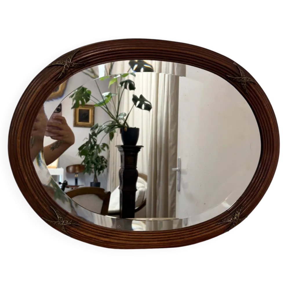 Ancien miroir ovale biseauté cadre en bois et décors bronze style Louis XVI