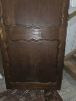 Ancienne porte moulurée en chêne