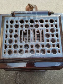 Ancien poêle en fonte émaillée ciney