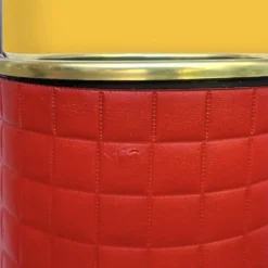 Ancien porte-parapluie en fer forgé et Skaï rouge – années 60