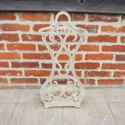 Ancien porte-parapluie en fonte émaillée blanche