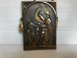 Bas relief la communion objet religieux