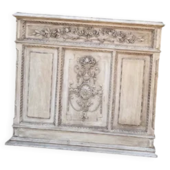 Boiserie ancienne en bois sculpté au décor floral style Louis XVI