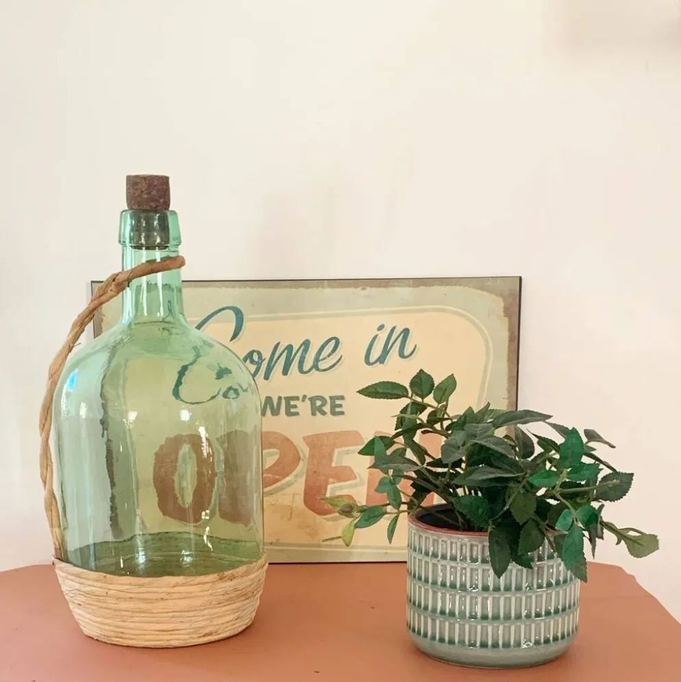 Bonbonne vintage en verre et raphia