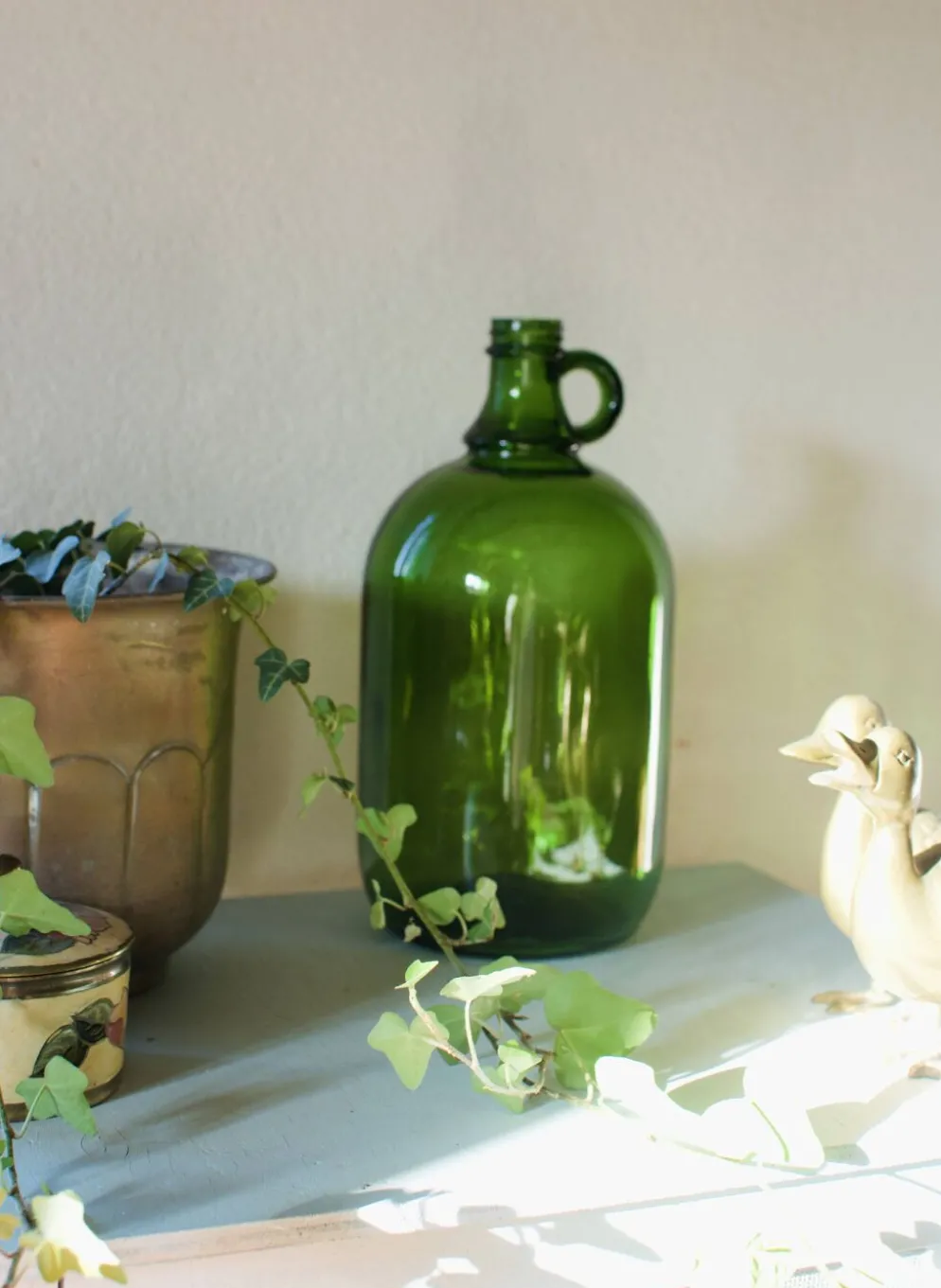 Bonbonne vintage en verre vert