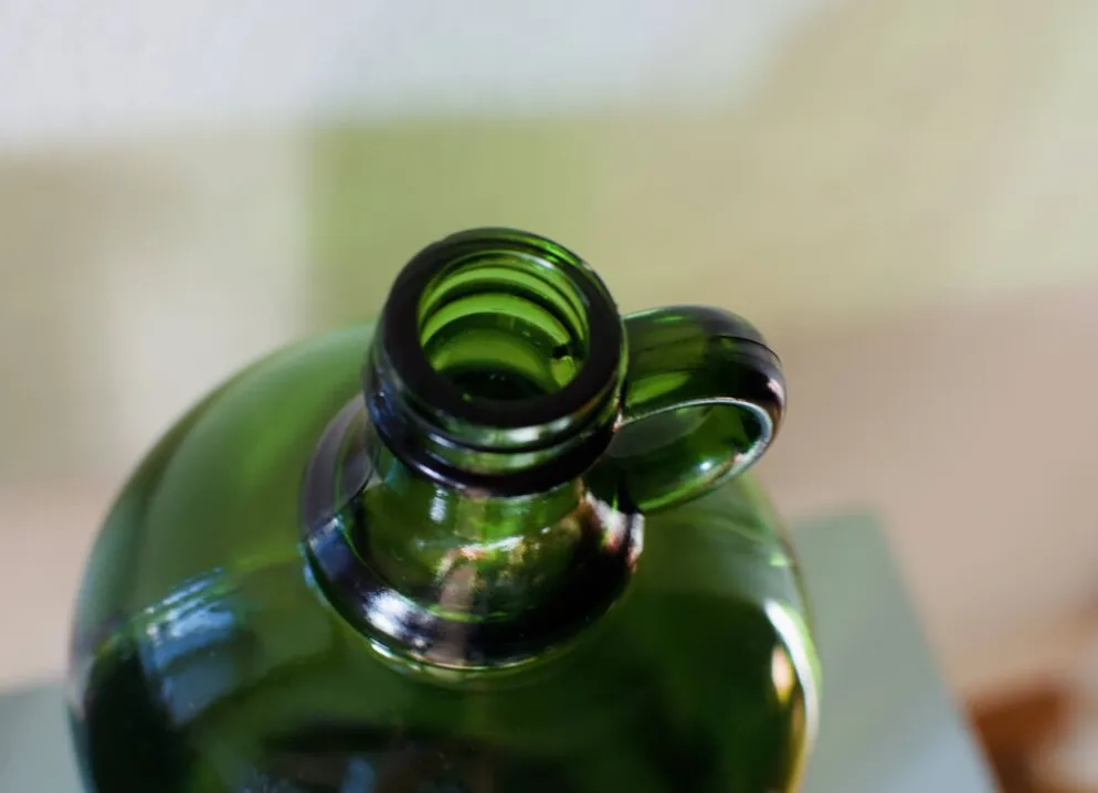 Bonbonne vintage en verre vert