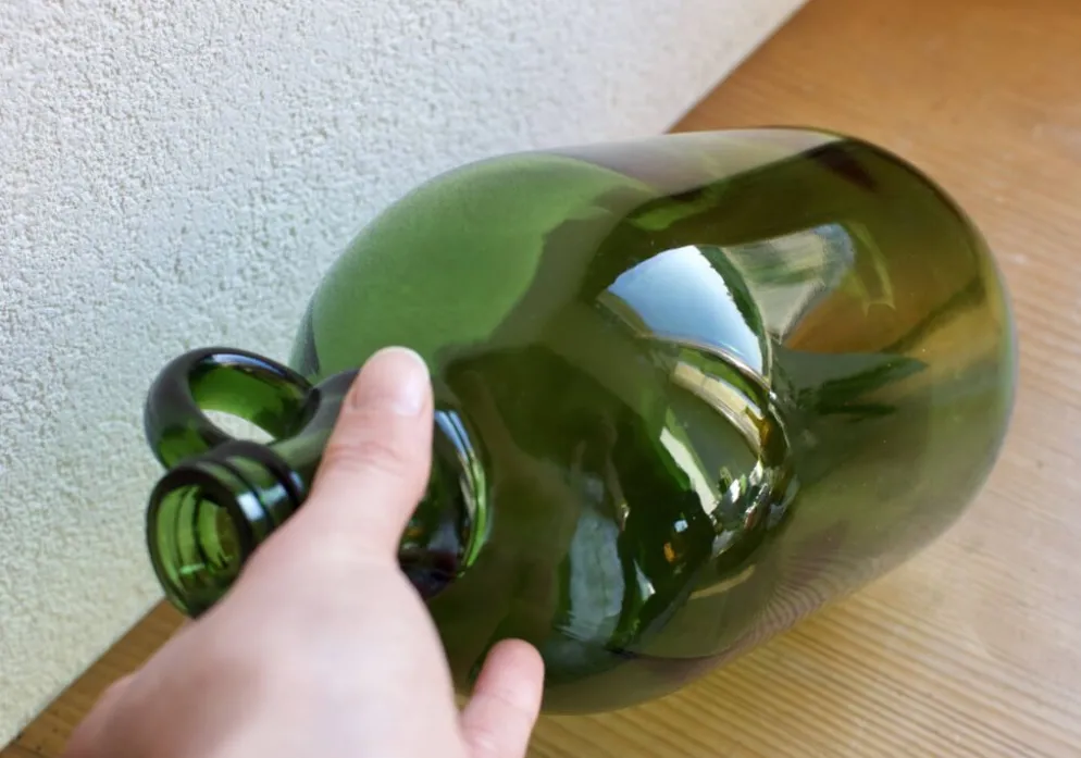 Bonbonne vintage en verre vert