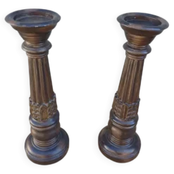 2 bougeoirs en bois sculpté