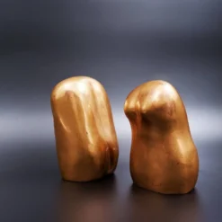 Bustes d'homme et de femme en bronze