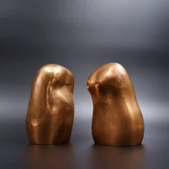 Bustes d'homme et de femme en bronze