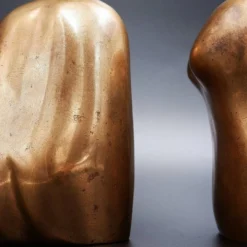Bustes d'homme et de femme en bronze