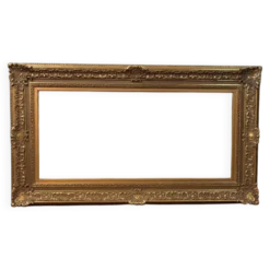 Cadre en bois stuqué et doré vers 1900