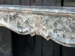 Cheminée de style régence en marbre gris des Ardennes vers 1900