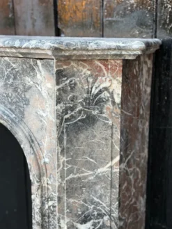 Cheminée de style régence en marbre gris des Ardennes vers 1900