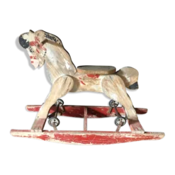 Cheval à bascule avec roulettes