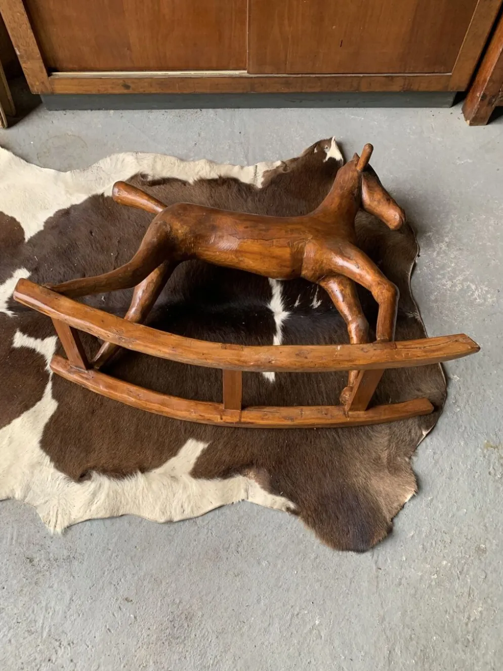 Cheval à bascule en bois