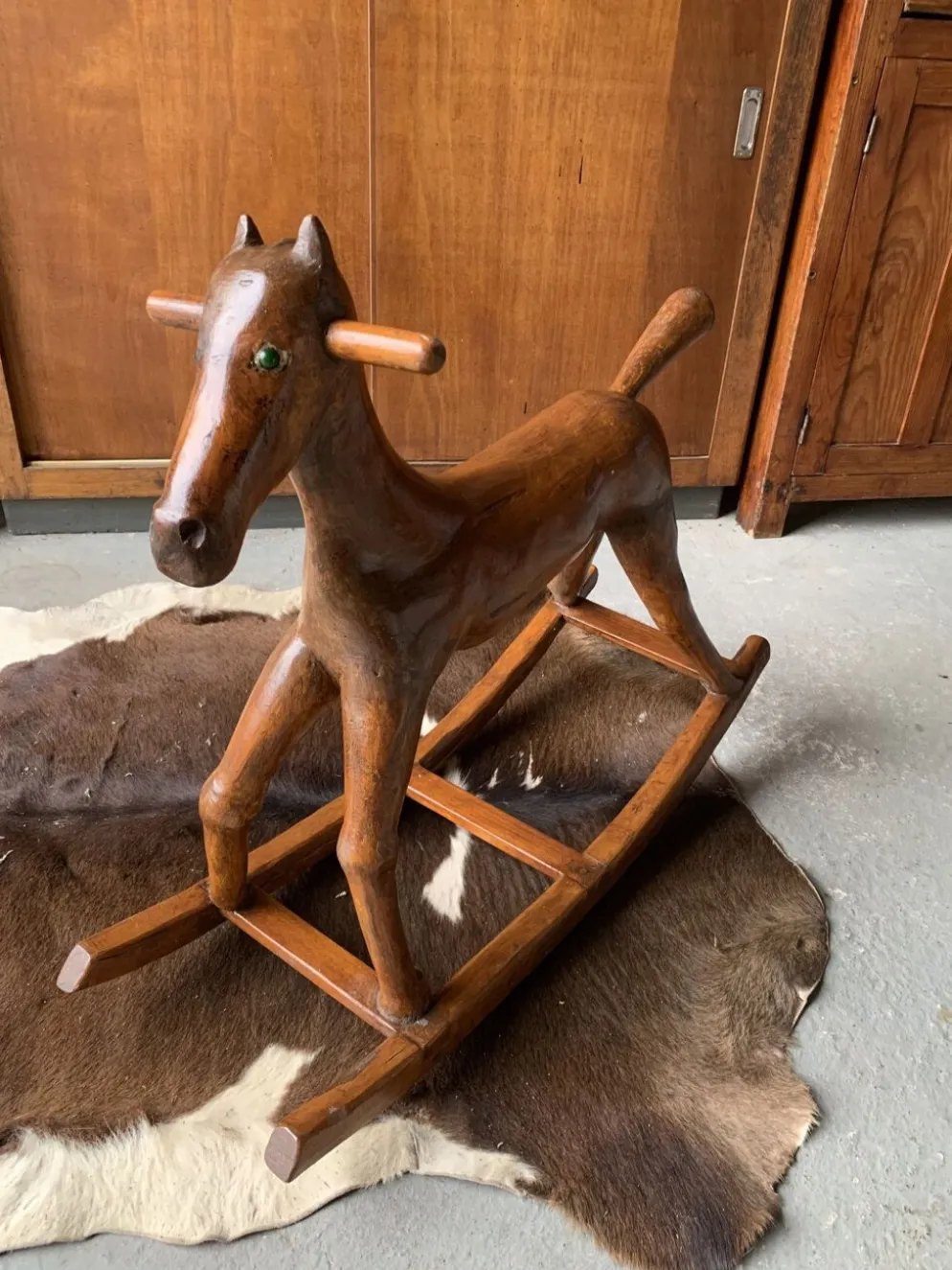 Cheval à bascule en bois