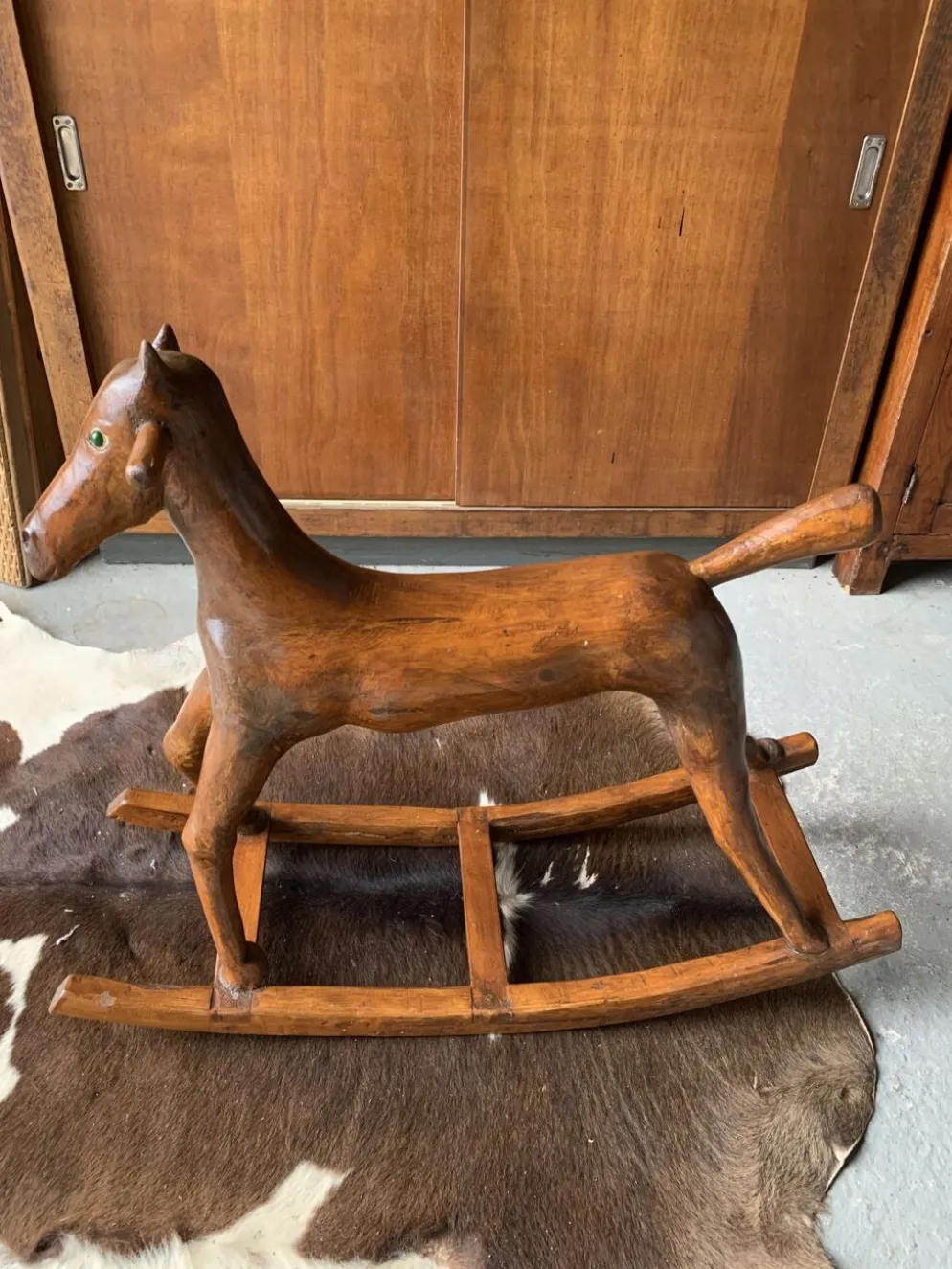 Cheval à bascule en bois