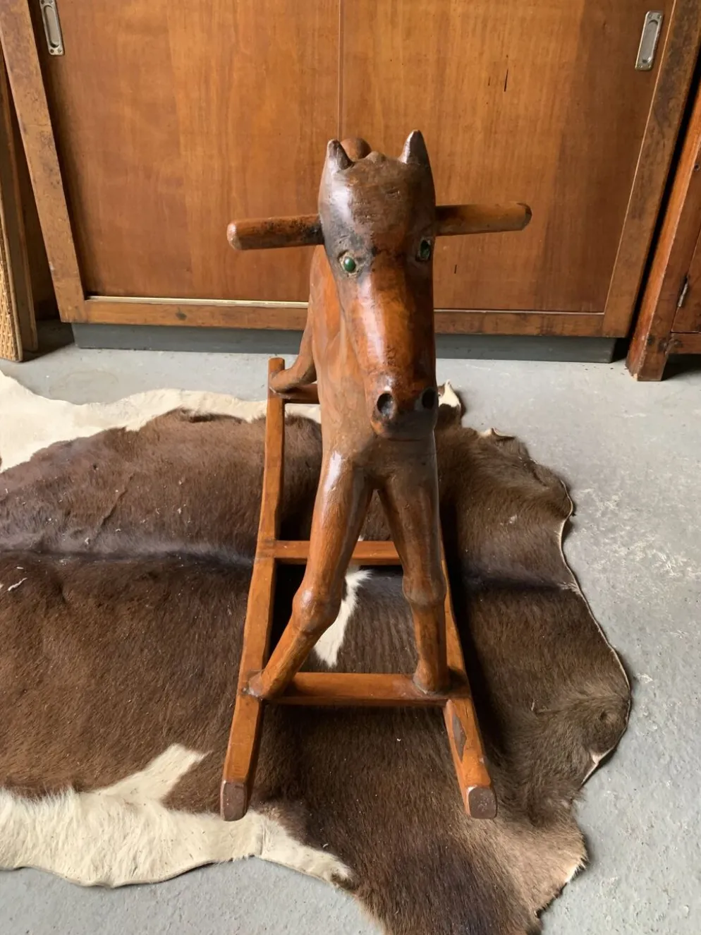 Cheval à bascule en bois