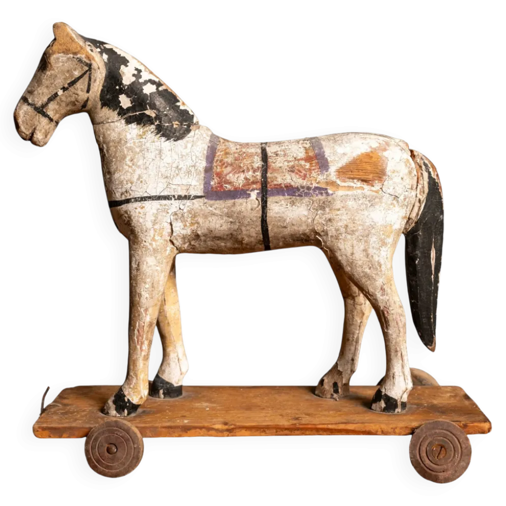 Cheval en bois ancien sur roues, début du 20e siècle