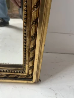 Console et miroir d'entre deux de style Louis XVI en bois doré