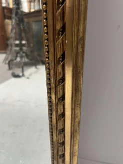 Console et miroir d'entre deux de style Louis XVI en bois doré