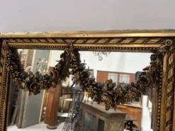 Console et miroir d'entre deux de style Louis XVI en bois doré