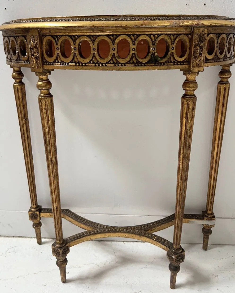 Console et miroir d'entre deux de style Louis XVI en bois doré