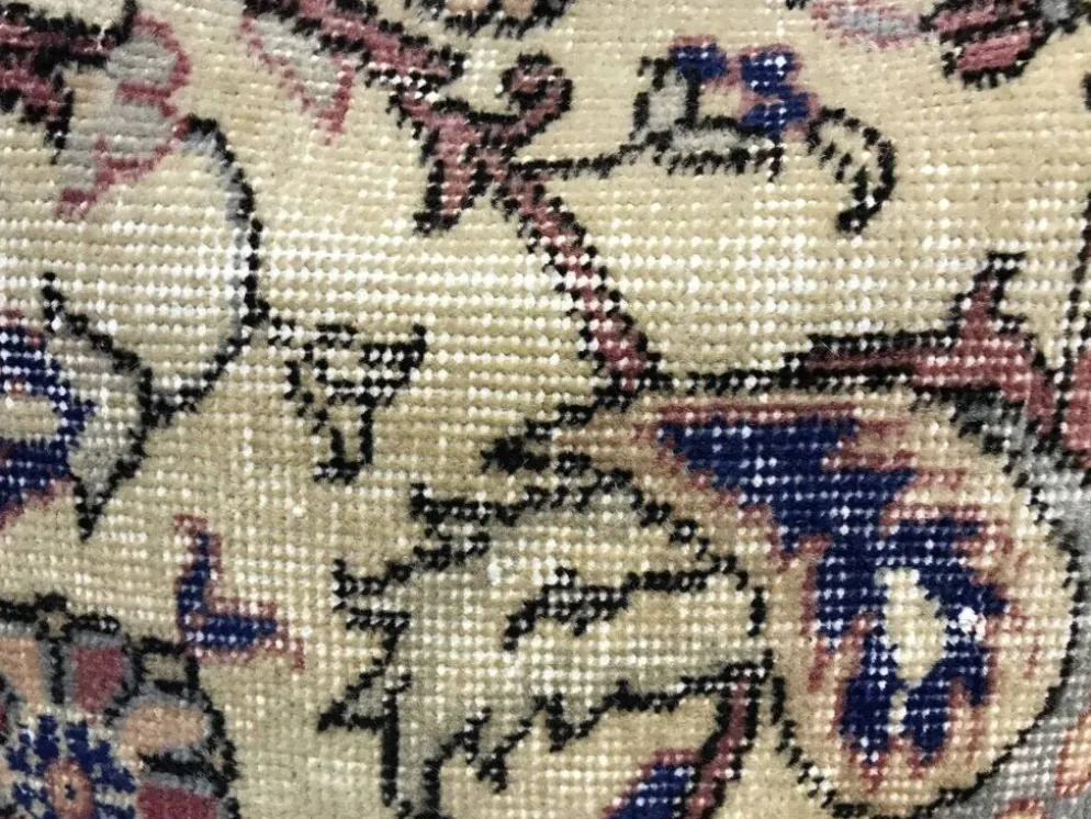 Coussin en tapis vintage fait main