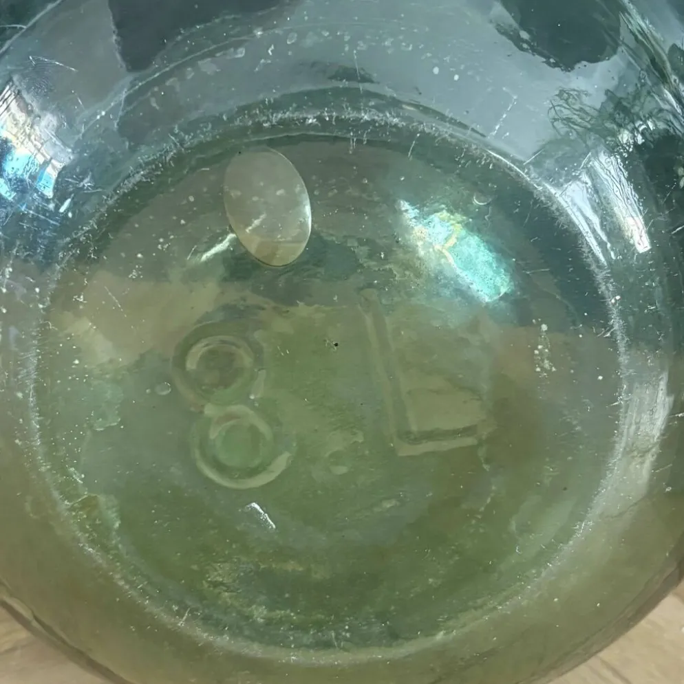 Dame-jeanne ancienne en verre vert