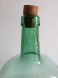 Dame jeanne bonbonne en verre verte Ayelense vintage