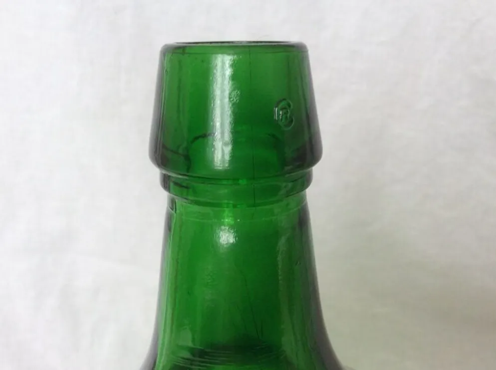 Dame Jeanne en verre vert émeraude