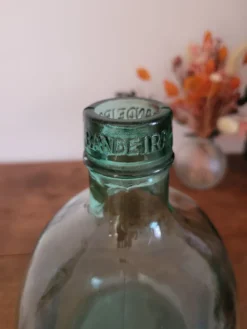 Dame-jeanne en verre vert oblongue