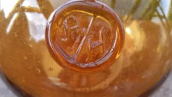 Dame Jeanne ou bonbonne verre soufflé ambré