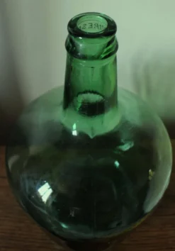 Dame jeanne Viresa Bonbonne en verre vert foncé