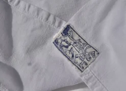 Drap ancien en métis, monogrammé FS avec jour Venise