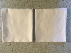 Duo de serviettes 57 x 63 damassé blanc