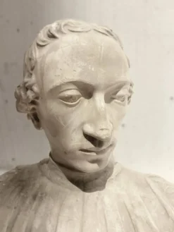 Epreuve en plâtre sculpté Buste d'un jeune homme XX siècle