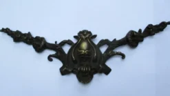 Fronton ancien en bronze