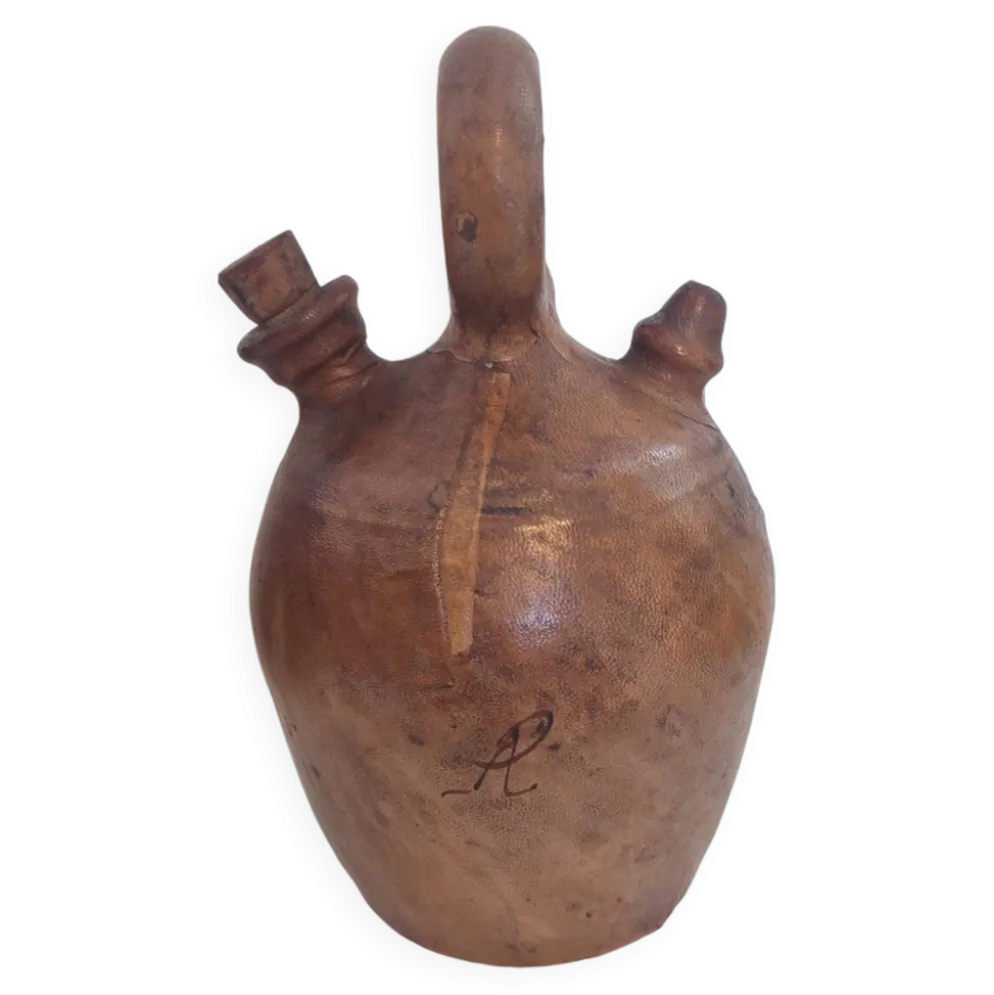 Gargoulette , cruche en terre cuite recouverte de cuir