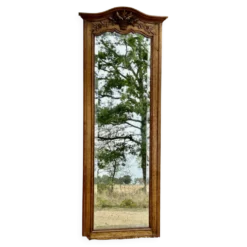 Grand et ancien miroir de pied chantourné biseauté