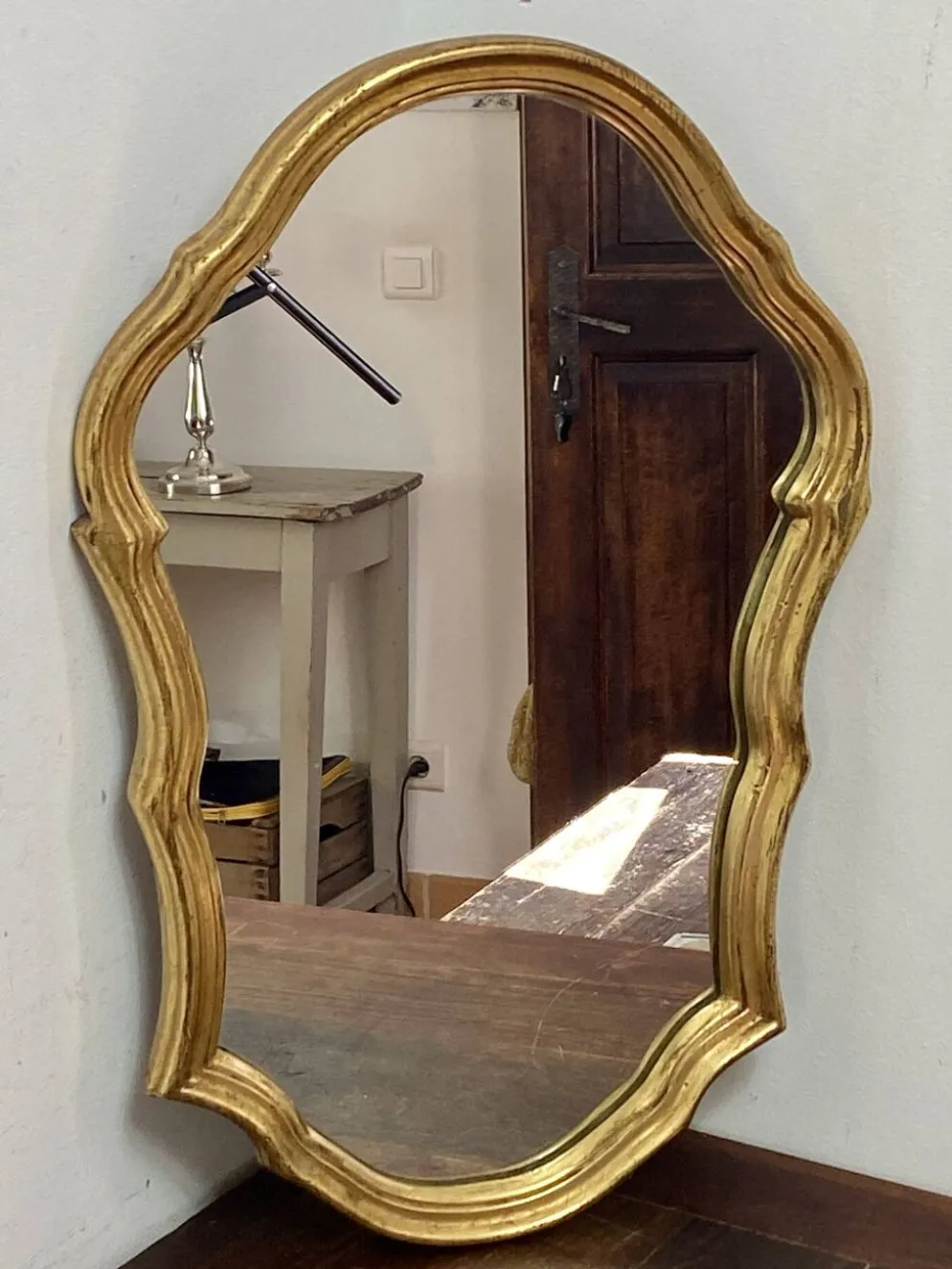 Grand miroir baroque en bois doré