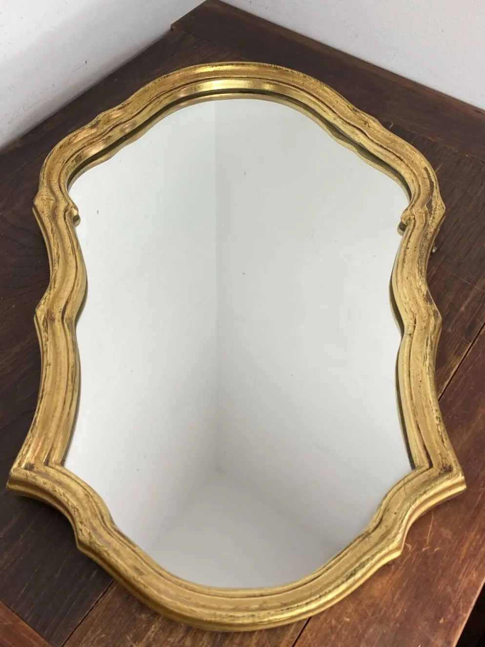 Grand miroir baroque en bois doré