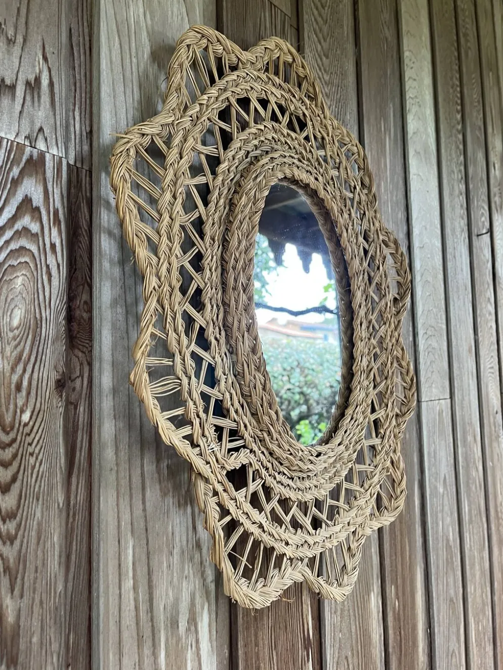 Grand miroir en jonc tressé 1960