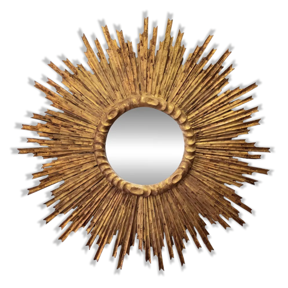 Grand miroir en soleil en bois sculpté et doré, années 1950