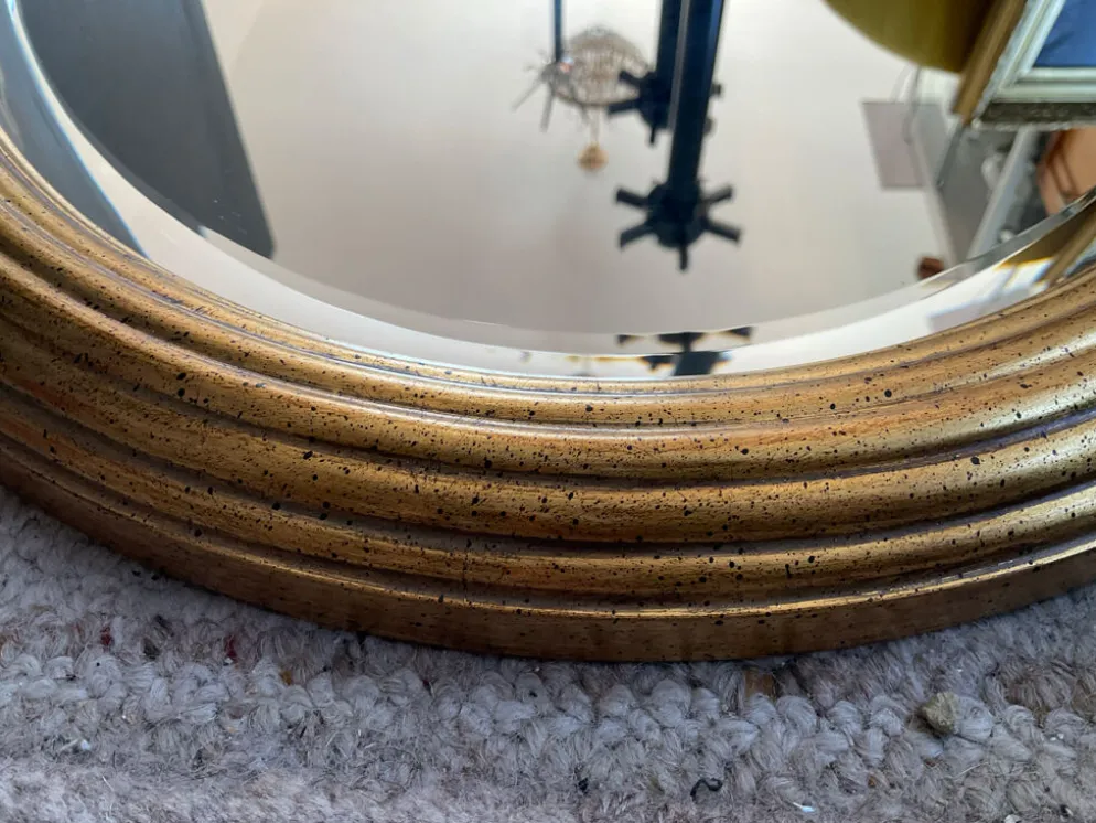 Grand miroir Ovale Deknudt en bois doré années 70