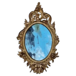 Grand miroir ovale doré, style Louis XV rocaille, fin XIXe, 114 x 66 cm