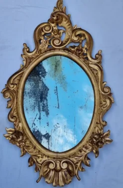 Grand miroir ovale doré, style Louis XV rocaille, fin XIXe, 114 x 66 cm