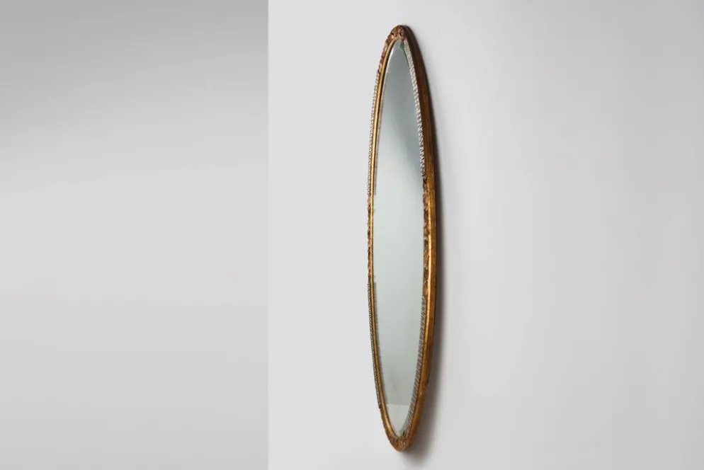 Grand miroir ovale en art déco doré et argenté, vers 1910
