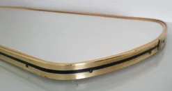 Grand miroir ovoïde vintage à bords dorés et noir - années 1960